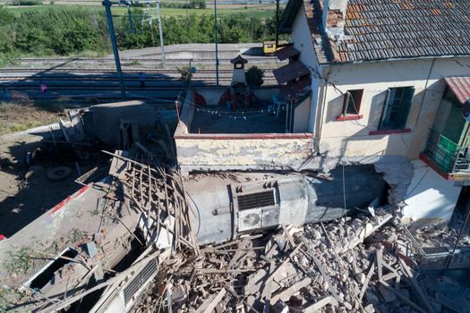 Thessaloniki, Greece - May 14, 2017: Train accident at Adendro, almost 40km west of Thessaloniki, with two confirmed dead among the passengers. The train crashed into a house after derailing.