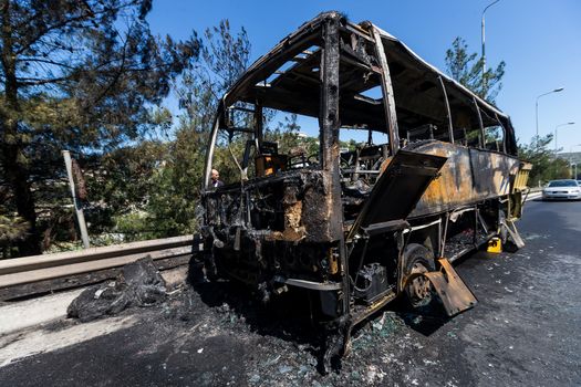 Thessaloniki, Greece - June 25, 2017: A tourist bus got fire and burned completely on the peripheral road of Thessaloniki. Passengers have been taken safely and harmless