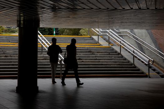 Motion blurred of walking in underpass