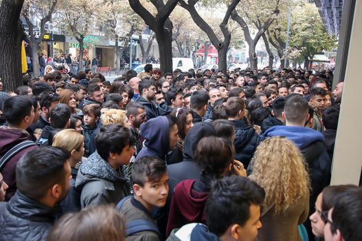 Thessaloniki, Greece - November 25, 2016. People wait outside a department store during Black Friday shopping deals, at the northern Greek city of Thessaloniki.