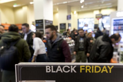 Thessaloniki, Greece - November 24, 2017. People shop inside a department store during Black Friday shopping deals, at the northern Greek city of Thessaloniki.