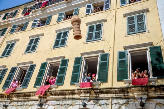 Corfu, Greece - April 27, 2019: Corfians throw clay pots from windows and balconies on Holy Saturday to celebrate the Resurrection of Christ