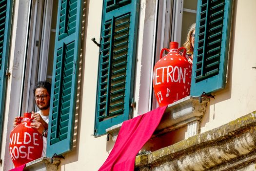 Corfu, Greece - April 27, 2019: Corfians throw clay pots from windows and balconies on Holy Saturday to celebrate the Resurrection of Christ