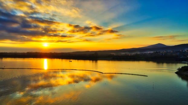 Sunrise over the wetland of Kerkini Lake one winter day in northern Greece. atmospheric effect