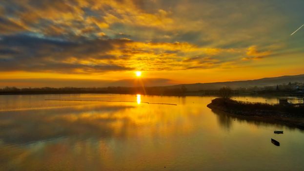 Sunrise over the wetland of Kerkini Lake one winter day in northern Greece. atmospheric effect