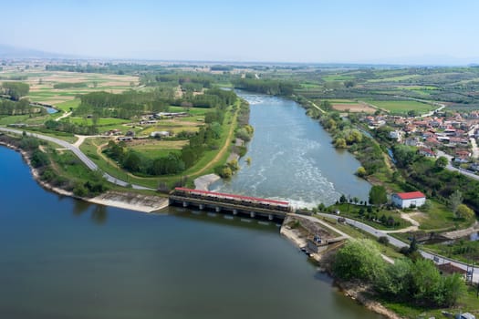 Aerial view of the artificial lake Kerkini and river Strymon with dam at the north Greece