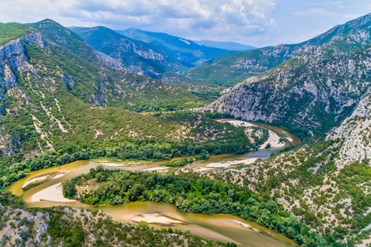 Aerial view of the river Nestos in Xanthi, Greece. The Nestos River forms on its long journey landscapes of unique beauty with rich forests, rare wetlands. favorite destination for canoe and kayak