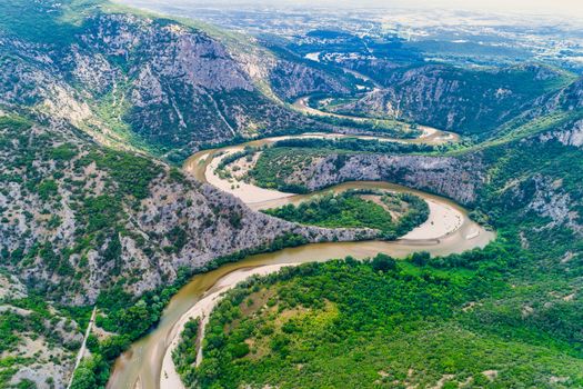 Aerial view of the river Nestos in Xanthi, Greece. The Nestos River forms on its long journey landscapes of unique beauty with rich forests, rare wetlands. favorite destination for canoe and kayak