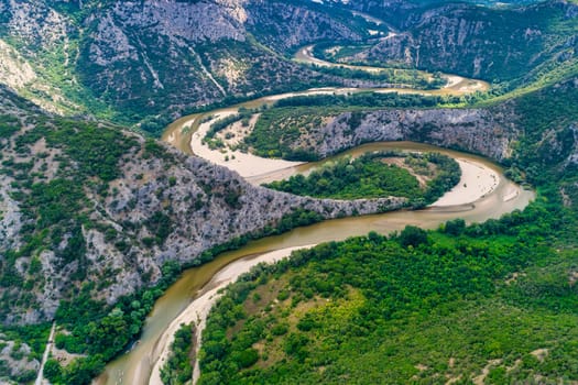 Aerial view of the river Nestos in Xanthi, Greece. The Nestos River forms on its long journey landscapes of unique beauty with rich forests, rare wetlands. favorite destination for canoe and kayak