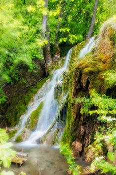 beautiful waterfall in the green forest in Skra at north Greece. Soft and Airy filter effect used