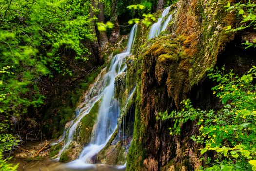 beautiful waterfall in the green forest in Skra at north Greece