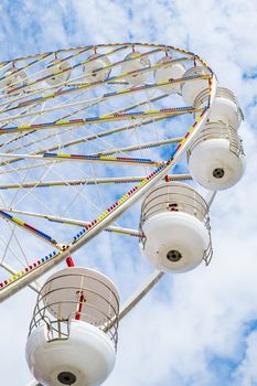 Ferris wheel on the pier at Blackpool against blue sky