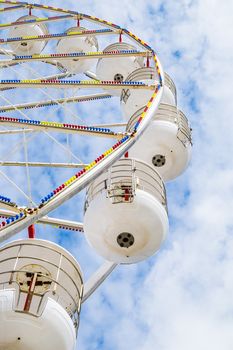 Ferris wheel on the pier at Blackpool against blue sky