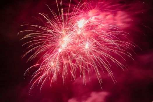 Colorful fireworks of various colors over night sky