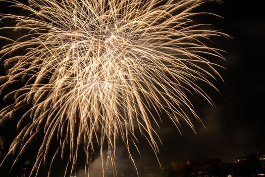 Colorful fireworks of various colors over night sky