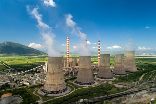 Aerial view the plant producing electrical energy with large pipes at Kozani in northern Greece.