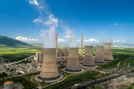 Aerial view the plant producing electrical energy with large pipes at Kozani in northern Greece.