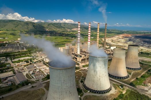 Aerial view the plant producing electrical energy with large pipes at Kozani in northern Greece.