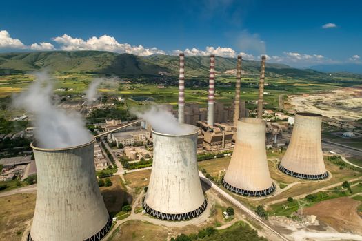 Aerial view the plant producing electrical energy with large pipes at Kozani in northern Greece.