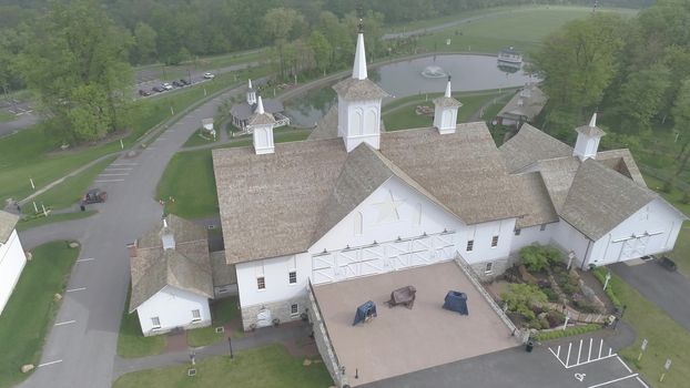 Aerial View of Old Restored Barns on a Spring Day