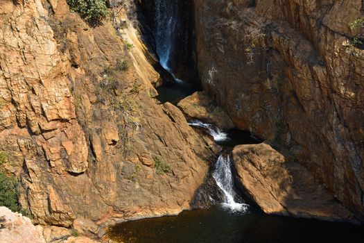 Natural cascade of pools in a rocky waterfall creek, Rustenburg, South Africa