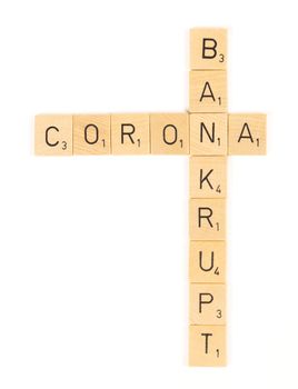 Corona bankrupt scrable letters, isolated on a white background