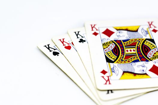 playing cards depicting the four kings isolated on a white background. King poker. Gambling and luck