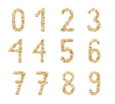 Digits made from coloured pencil shavings for use in your design.