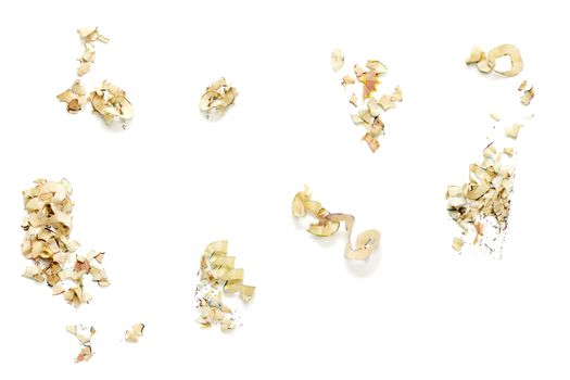 Design Elements made from pencil shavings on white background.