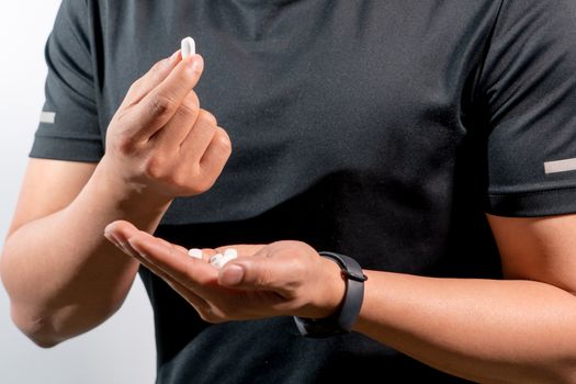 focus on the men hand holding the medicine, medicine recovery concept