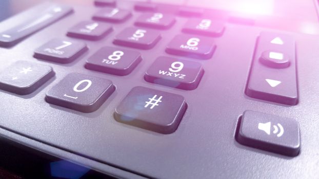 close up on the numbers on the keypad phone, fixed phone