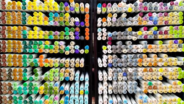 the colorful of drawing pen on the shelf at stationery shop