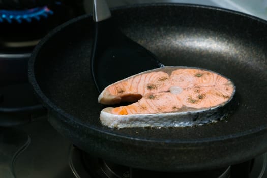grilled fish salmon fillet on the pan