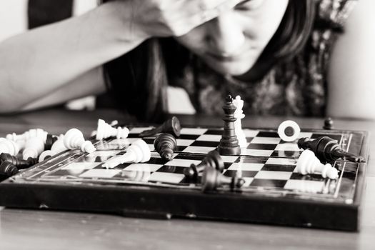 the loser women sad after  fighting the chess