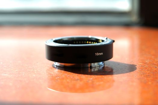 closeup the black extender lens 16 mm
