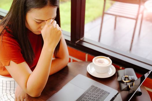 woman tired after long working on laptop