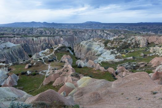 Beautiful unreal landscape of abandoned caves in the mountains of Cappadocia