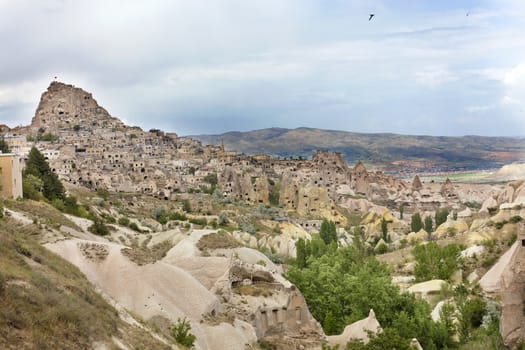 Uchisar Castle in Cappadocia, Nevsehir, Turkey. The special stone formation of Cappadocia.