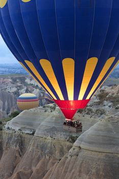 A view of the colored balloon flying over the Valley at dawn. Cappadocia. 12.05.2018. Turkey.