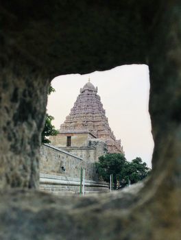 The Brihadisvara or Brihadeeswar temple located in Gangaikonda Cholapuram, Tamilnadu is one of the oldest structure built by Rajendra Chola-I in 11th Century AD. This is the Hindu temple built in Dravidian architecture style. The temple is entirely built with granite stones and the temple contains many monolithic sculptures in it. Also tamil words are inscribed in the wall of the temple. This temple is dedicated to Lord shiva and it is a UNESCO world heritage site.