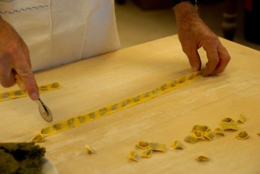 Preparation of agnolotti. Typical pasta of the Langhe, Piedmont - Italy