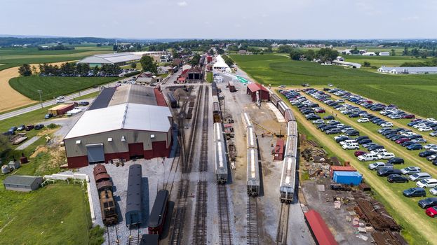 Aerial View of Train Yard Waiting for Trains on a Sunny Summer Day