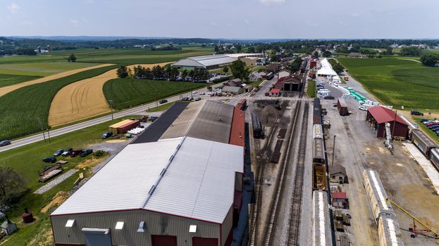 Aerial View of Train Yard Waiting for Trains on a Sunny Summer Day