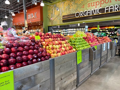 Orlando, FL/USA - 5/10/20: A display of different types of apples at a Publix grocery store.