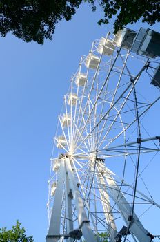 Old carousel on the coastal boulevard in Baku.Old ferris wheel.Azerbaijan.