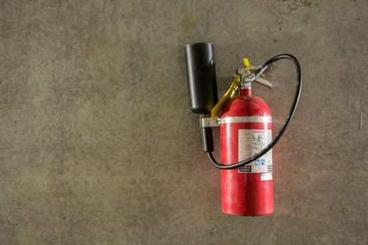 Fire extinguisher in dimly lit corridor Fire safety underground