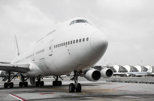Passenger planes at the airport shoot on the bus
