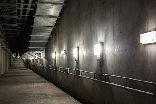 Empty industrial garage room interior with concrete floor and wall background