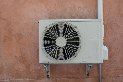 air compressor on the vintage brick wall