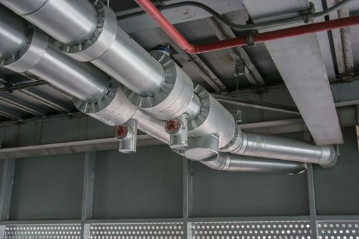 cables and piping as found inside of a thermal power